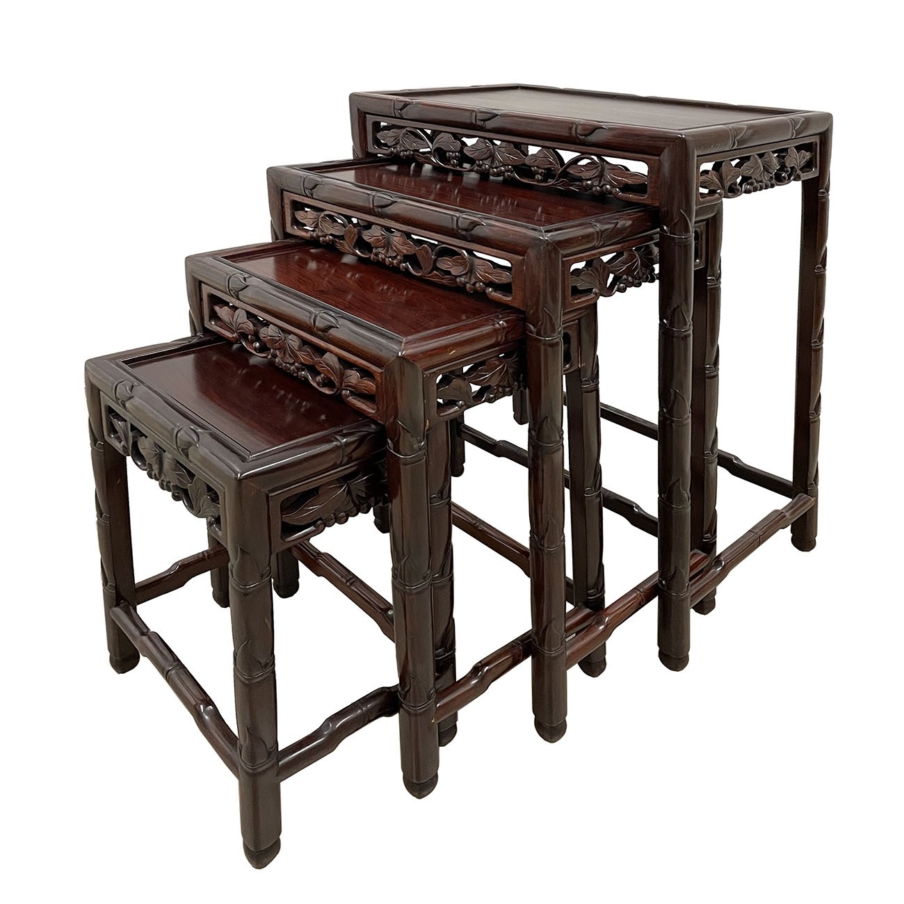 Early 20th Century Chinese Carved Rosewood Nesting Table Set - Set of 4